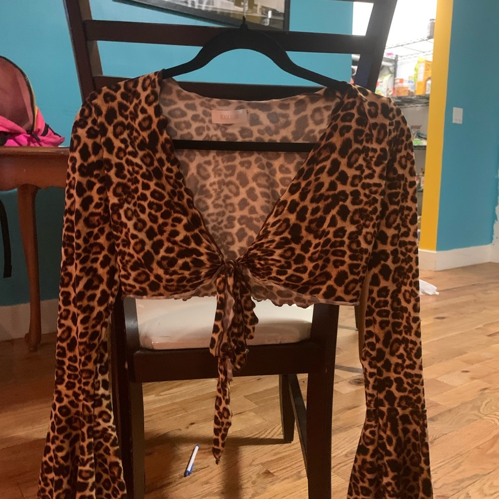 Self tie leopard print crop top with bell sleeves. Y2K